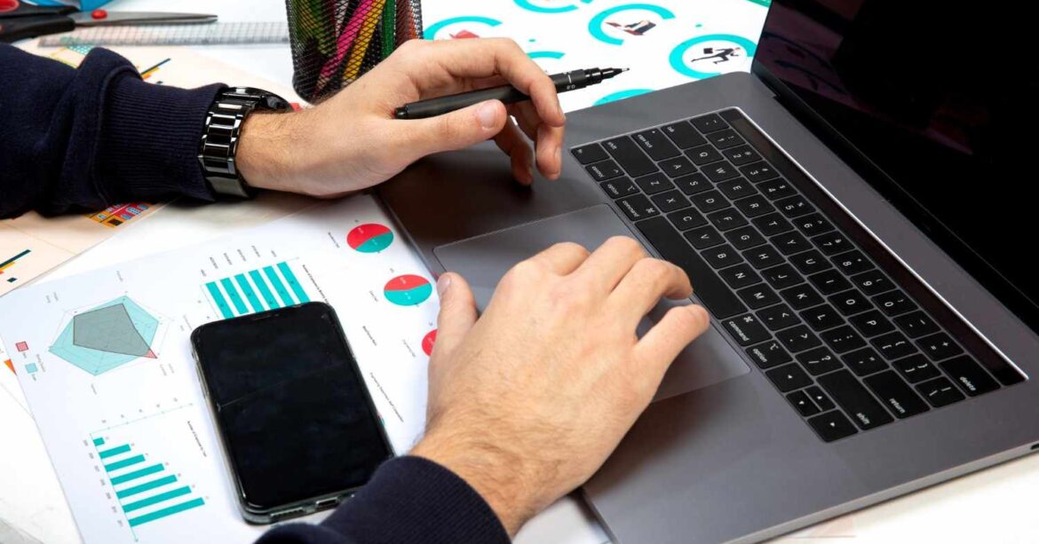 Marketing team analyzing campaign performance data and analytics