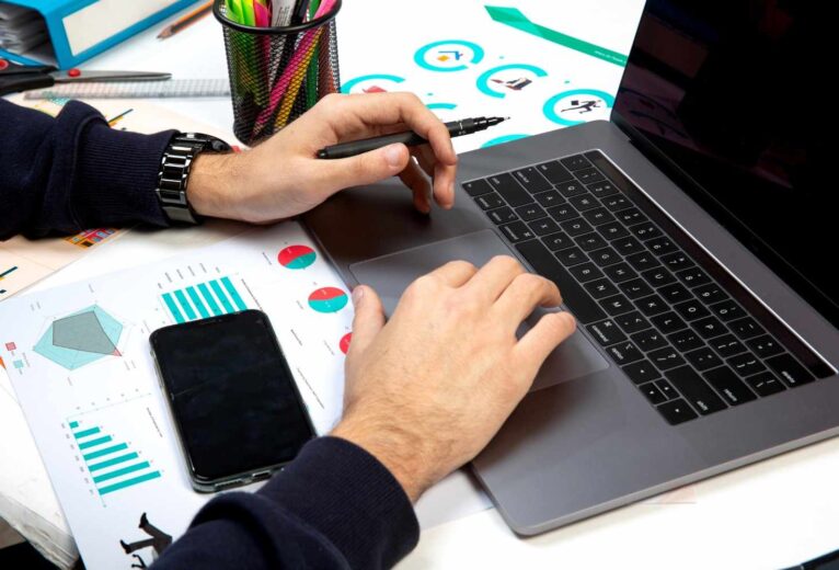 Marketing team analyzing campaign performance data and analytics